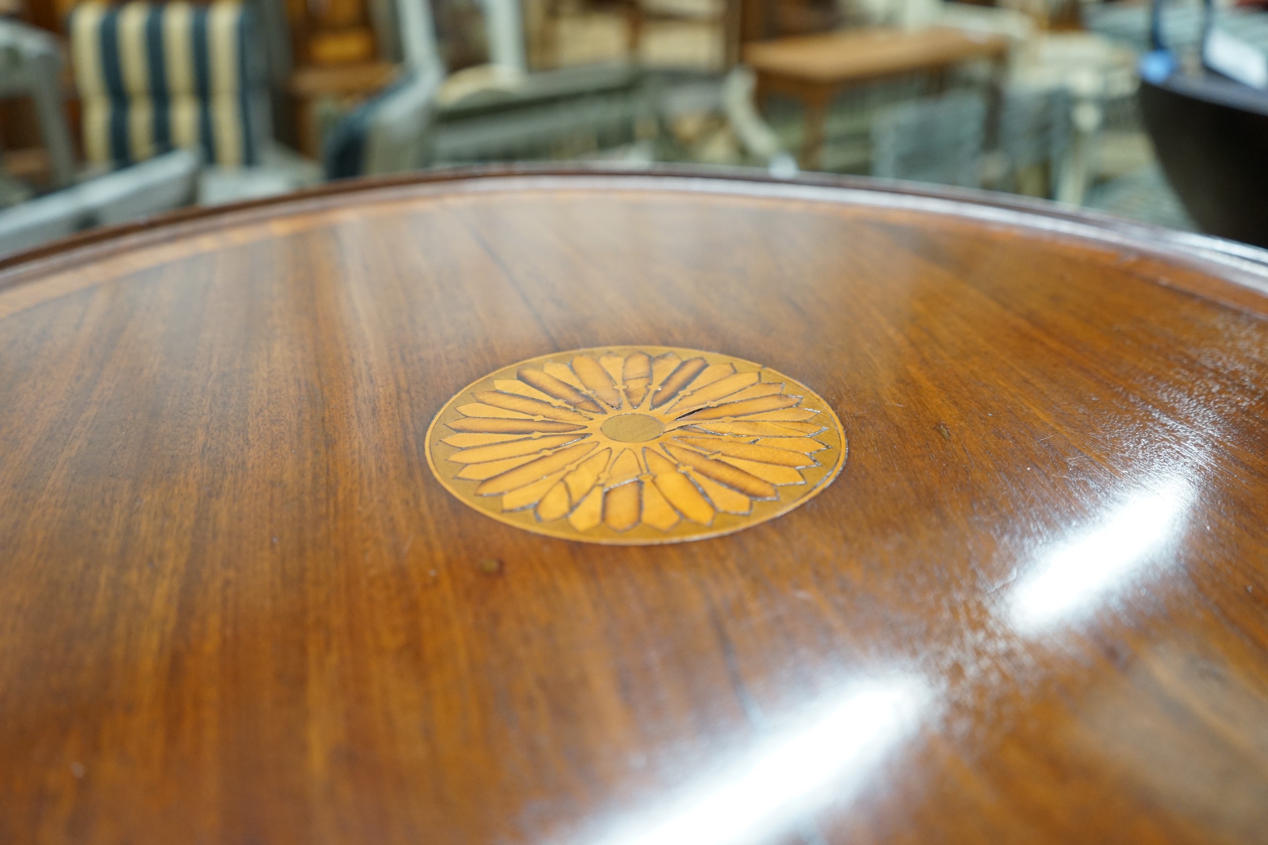 A George III and later circular inlaid mahogany tilt top tripod table, diameter 59cm, height 71cm